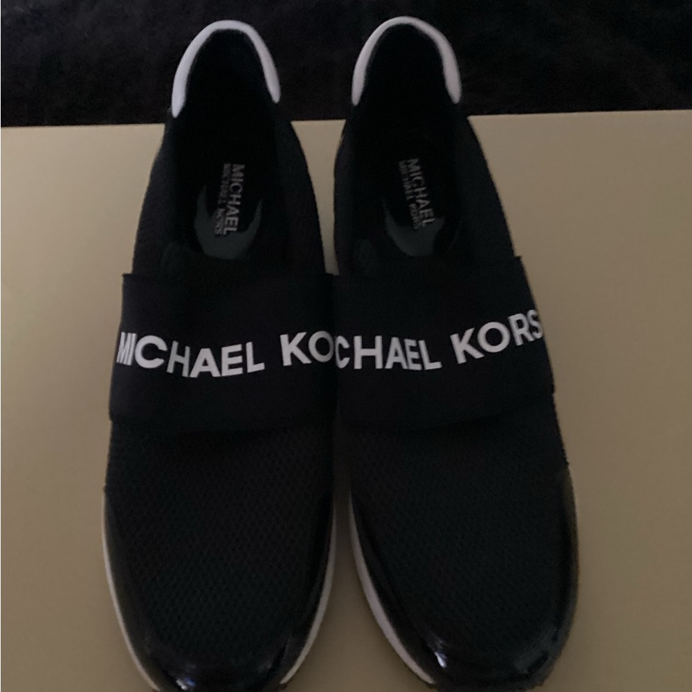 Michael Kors Black and White Slip-On Shoes - Picture 1 of 4